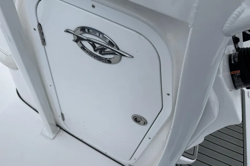 Slide: The Image of 2026 Tidewater 198 CC Adventure boat console with logo detail. - 15