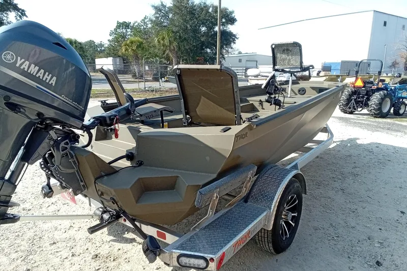 Slide: The Image of 2025 Thor 1754 Timber Hammer boat with Yamaha engine on trailer. - 7
