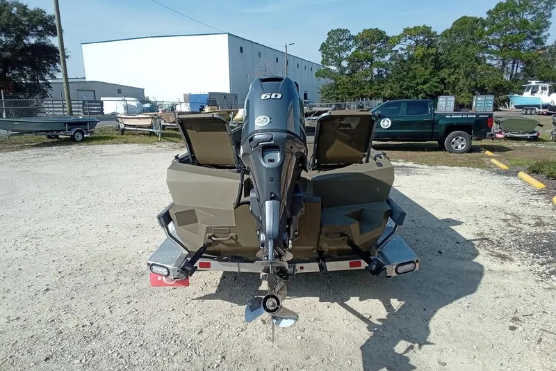 Slide: The Image of Rear view of 2025 Thor 1754 Timber Hammer boat with 60 HP outboard motor. - 8