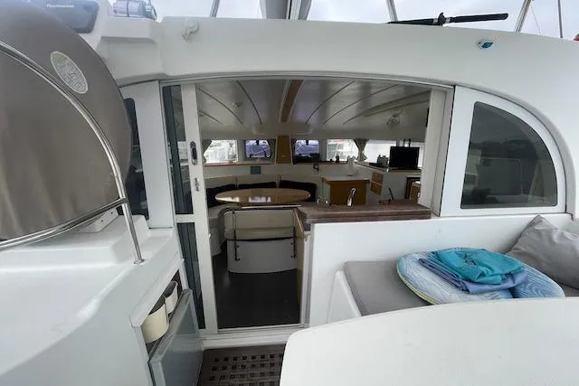 Slide: The Image of 2014 Lagoon 380 S2 catamaran deck with ocean view. - 15