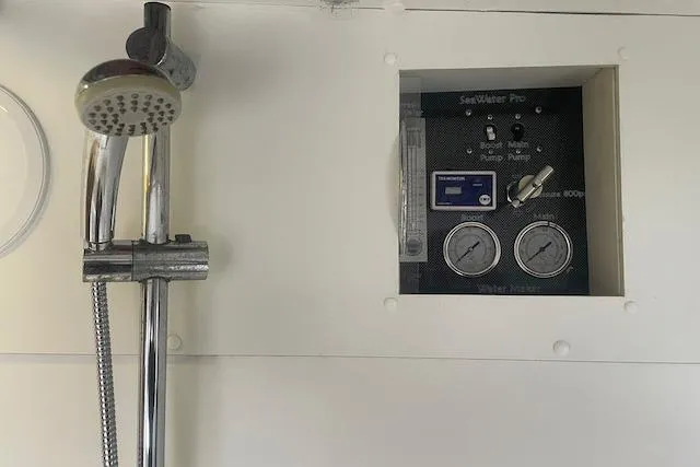 Slide: The Image of Interior of 2014 Lagoon 380 S2 catamaran with cozy seating and large windows. - 32