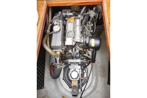 Slide: The Image of Engine compartment of 2014 Lagoon 380 S2 sailboat, showcasing mechanical components. - 58