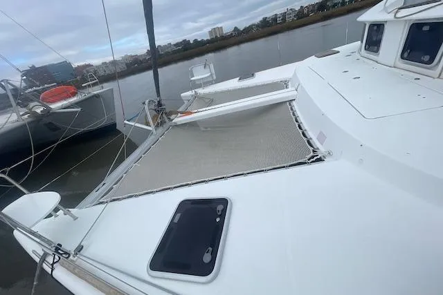 Slide: The Image of 2014 Lagoon 380 S2 yacht cockpit with navigation instruments and seating. - 6