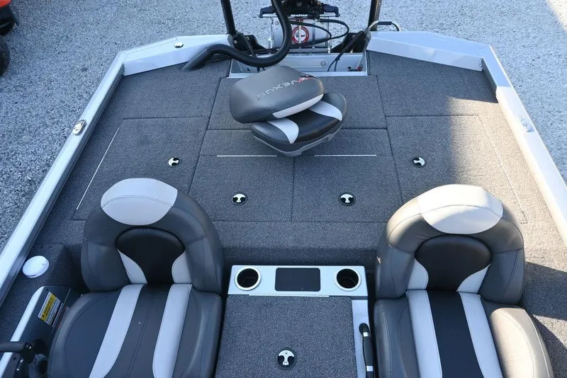 Slide: The Image of 2023 Vexus AVX2080 boat interior with gray seating and carpeted deck. - 8