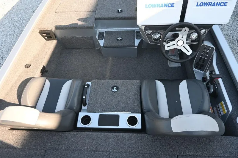 Slide: The Image of 2023 Vexus AVX2080 boat interior with dual seats and steering console. - 9