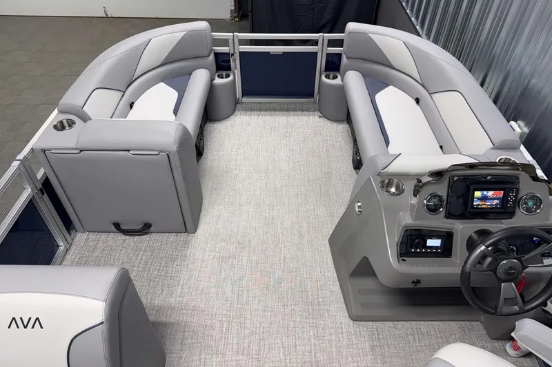 Slide: The Image of Interior of 2026 Avalon Venture 2185 VRB pontoon boat with modern seating and control panel. - 11