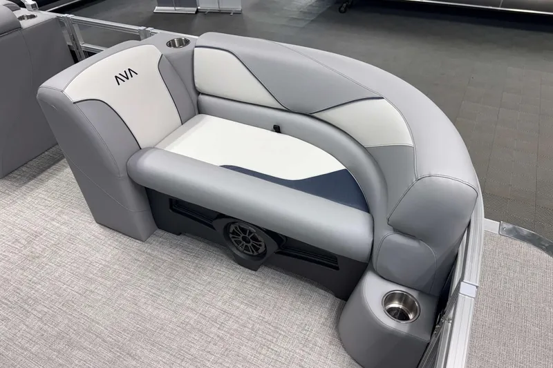 Slide: The Image of Luxurious seating in the 2026 Avalon Venture 2185 VRB pontoon boat, featuring cup holders. - 12