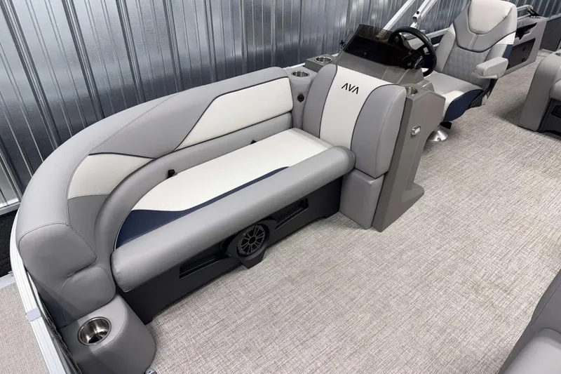 Slide: The Image of 2026 Avalon Venture 2185 VRB pontoon boat interior with plush seating and modern design. - 13