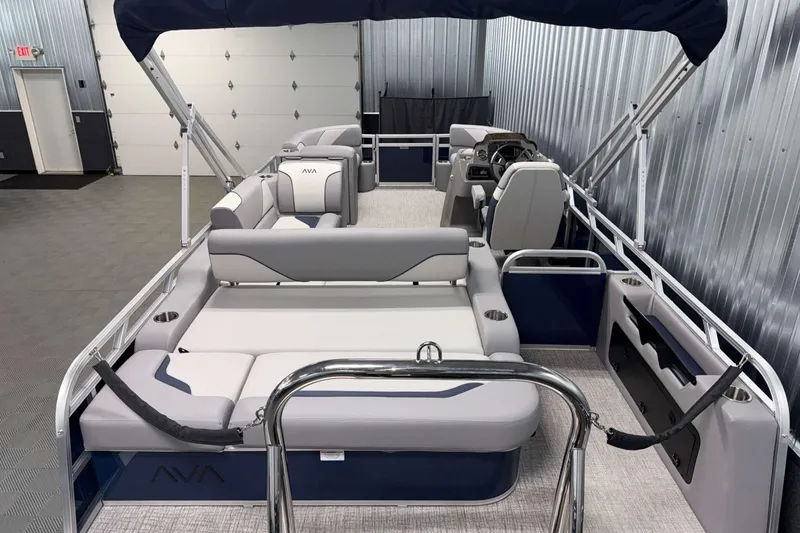 Slide: The Image of 2026 Avalon Venture 2185 VRB pontoon boat interior with seating and helm station. - 21