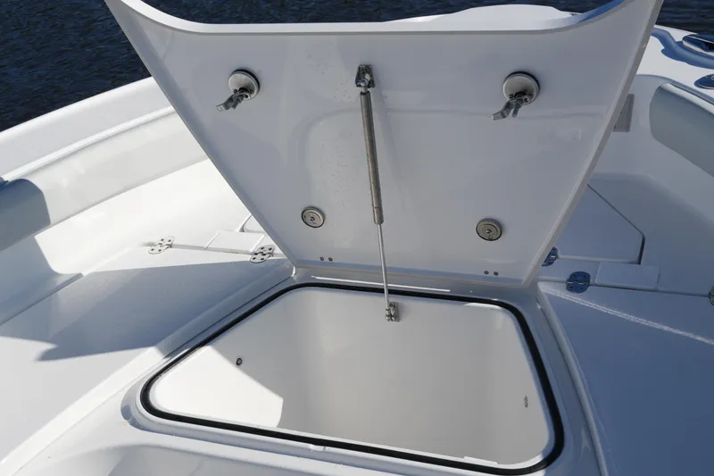 Slide: The Image of Open storage compartment on 2026 Blackfin 242 HB boat, showcasing interior space. - 32