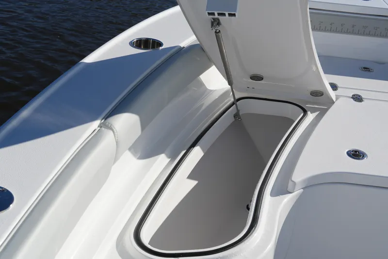 Slide: The Image of Open storage compartment on 2026 Blackfin 242 HB boat, showcasing sleek design and functionality. - 33