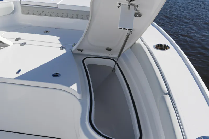 Slide: The Image of Open storage compartment on 2026 Blackfin 242 HB boat, showcasing sleek design and functionality. - 34