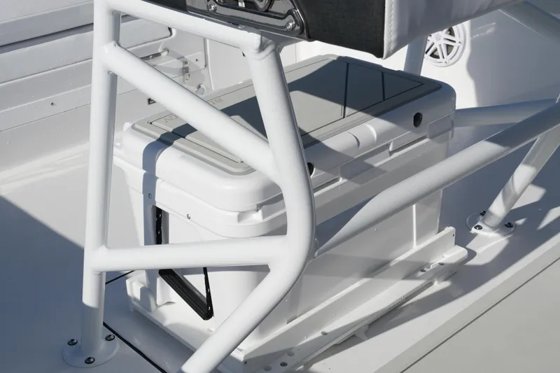Slide: The Image of 2026 Blackfin 242 HB boat interior with white cooler and seating frame. - 37