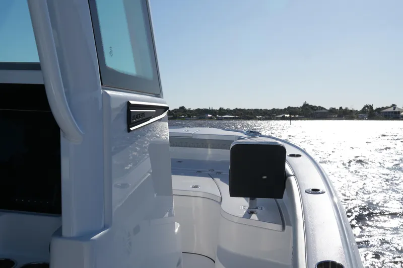 Slide: The Image of 2026 Blackfin 242 HB boat on water, showcasing sleek design and modern features. - 44