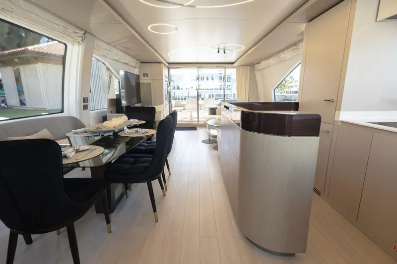 Slide: The Image of Luxurious interior of 2021 Azimut Fly 72 yacht with elegant dining area and modern design. - 21