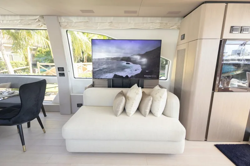 Slide: The Image of Luxurious interior of 2021 Azimut Fly 72 yacht with modern decor and large TV. - 22