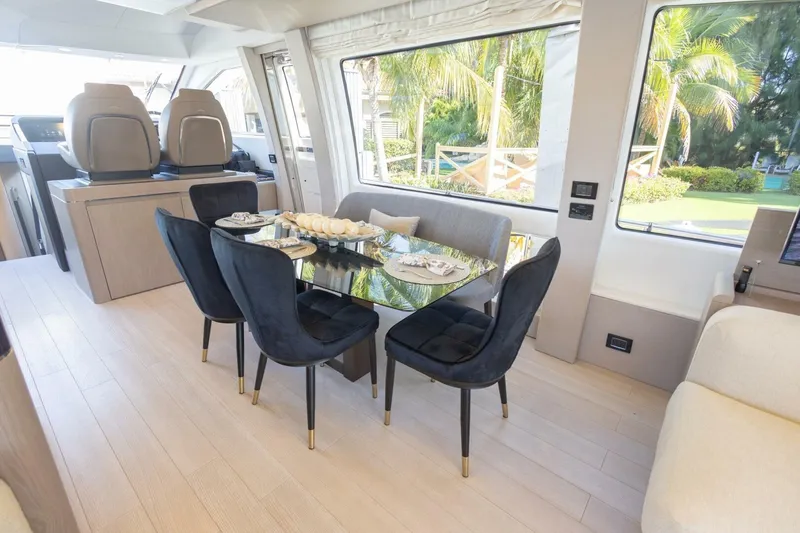 Slide: The Image of Luxurious interior of 2021 Azimut Fly 72 yacht with elegant dining area. - 23
