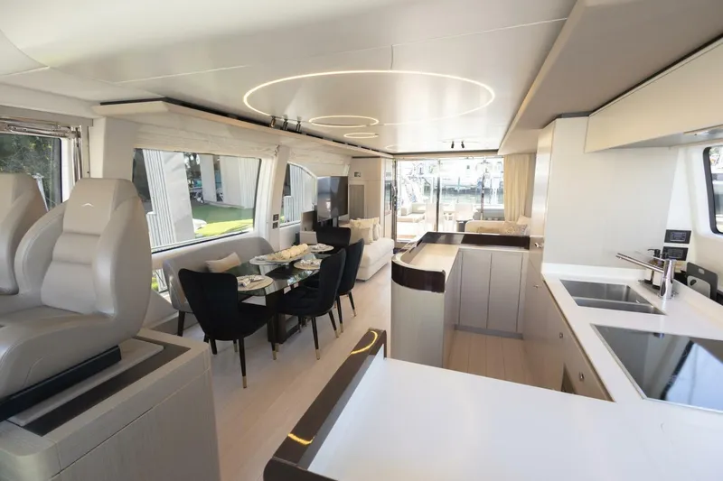 Slide: The Image of Luxurious interior of 2021 Azimut Fly 72 yacht with modern dining and kitchen area. - 25