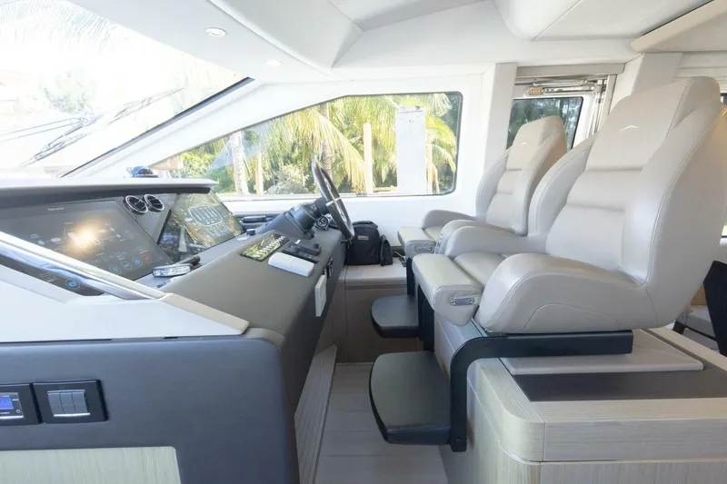 Slide: The Image of Interior of 2021 Azimut Fly 72 yacht cockpit with modern controls and seating. - 31