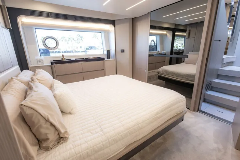 Slide: The Image of Luxurious bedroom interior of 2021 Azimut Fly 72 yacht with modern design and large window. - 34