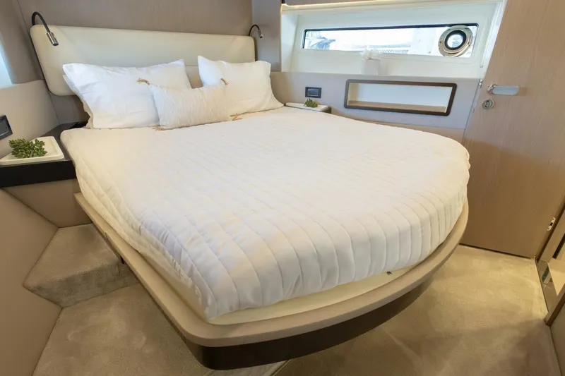 Slide: The Image of Luxurious bedroom interior of 2021 Azimut Fly 72 yacht with elegant bedding. - 39