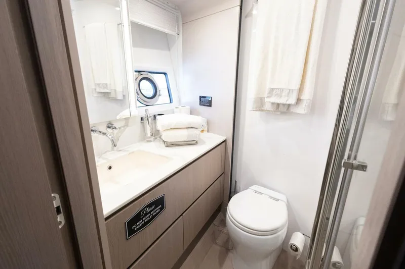 Slide: The Image of Luxurious bathroom in 2021 Azimut Fly 72 yacht with modern fixtures and elegant design. - 43