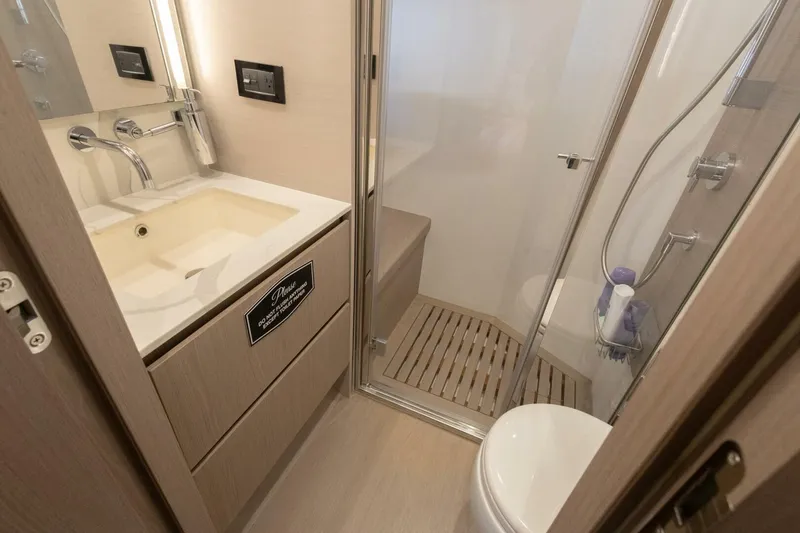 Slide: The Image of Luxurious bathroom in 2021 Azimut Fly 72 yacht with modern fixtures and shower. - 48