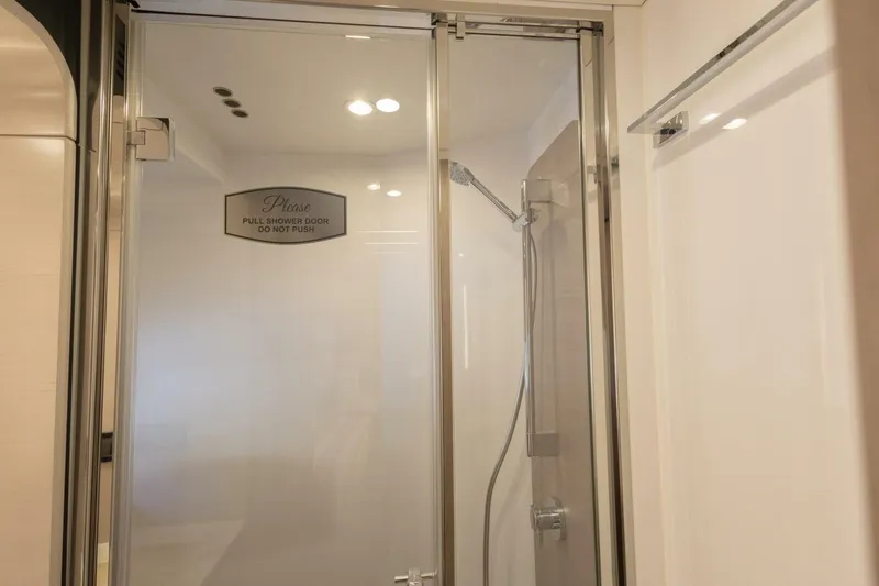 Slide: The Image of Shower area in 2021 Azimut Fly 72 yacht with glass door and modern fixtures. - 49