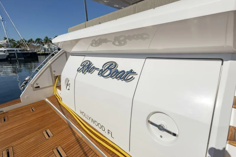 Slide: The Image of Azimut Fly 72 yacht, 2021 model, docked in Hollywood, FL, with wooden deck. - 5
