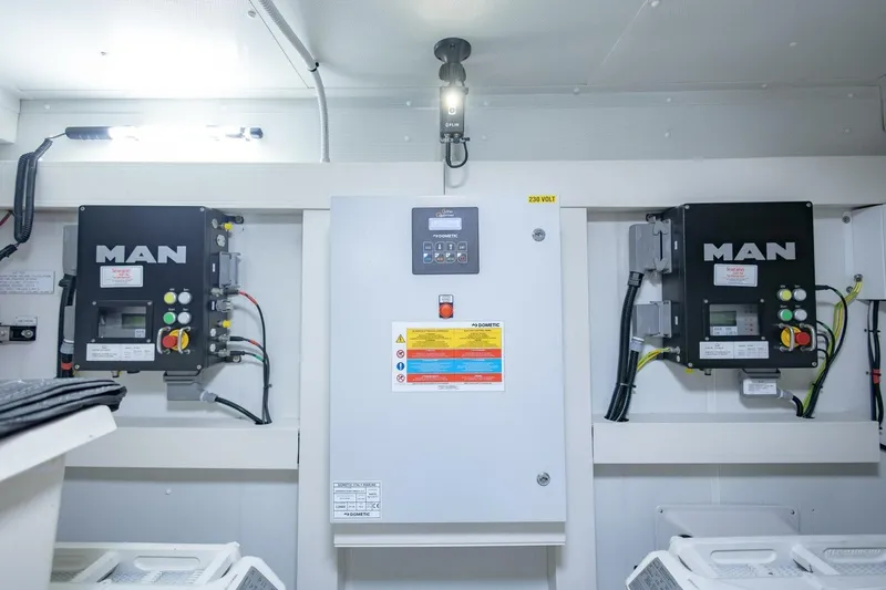 Slide: The Image of Engine room of 2021 Azimut Fly 72 yacht with MAN control panels. - 72