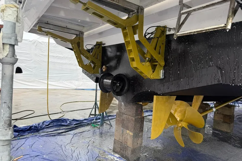 Slide: The Image of Azimut Fly 72 yacht under maintenance, showcasing propeller and hydraulic components, 2021 model. - 81