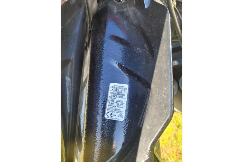 Slide: The Image of Close-up of a 2024 Triton 18 TrX boat engine label. - 17