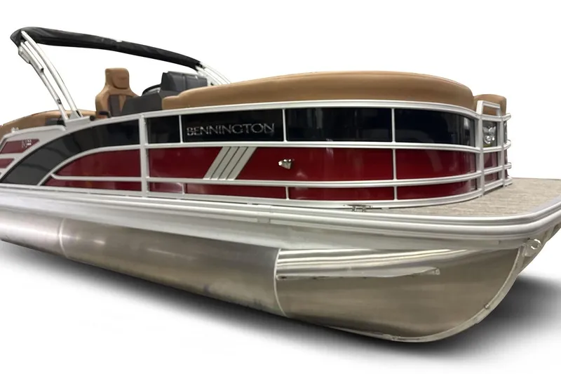 The Image of 2026 Bennington 22 M Open Fastback Quad Bench pontoon boat, sleek design, red and silver accents. - 0