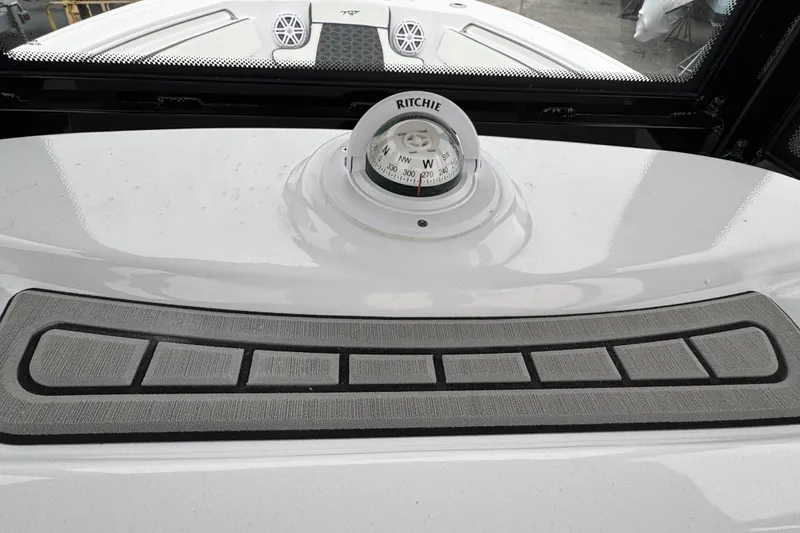 Slide: The Image of Compass on 2026 Tidewater 210 CC Adventure boat dashboard. - 11