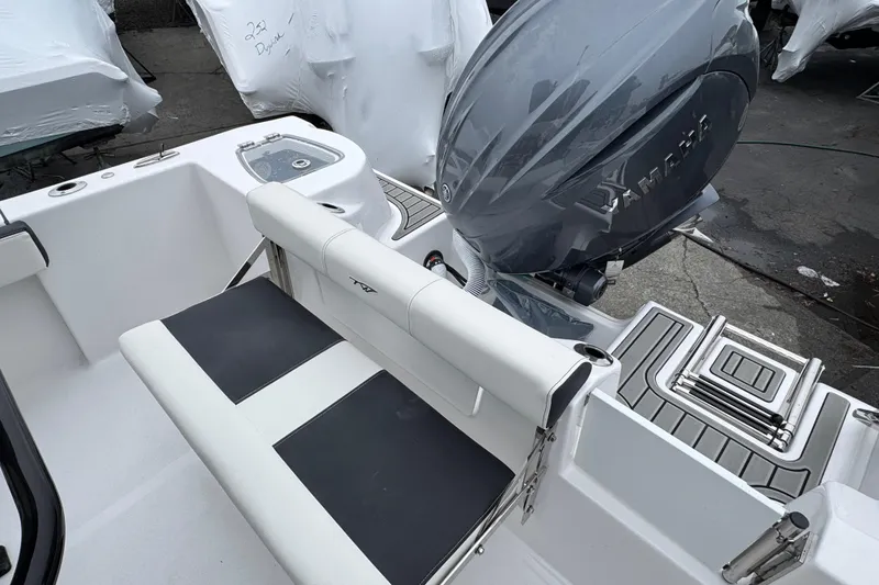 Slide: The Image of 2026 Tidewater 210 CC Adventure boat with Yamaha engine and seating area. - 3