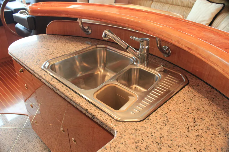 Slide: The Image of Luxury yacht kitchen sink with granite countertop, Horizon P70, 2004 model. - 10