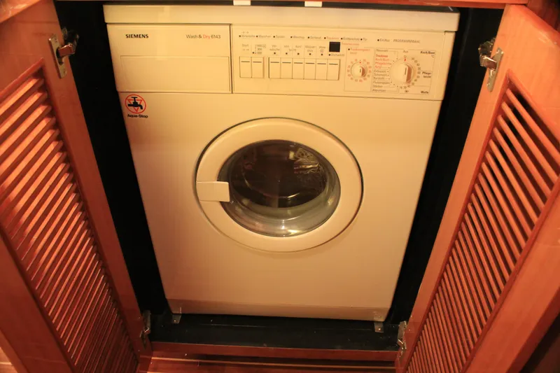 Slide: The Image of Washing machine in wooden cabinet on Horizon P70 yacht, 2004 model. - 15