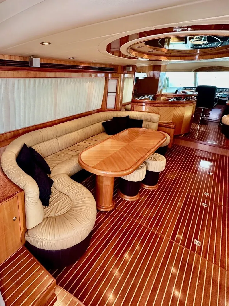 Slide: The Image of Luxurious 2004 Horizon P70 yacht interior with elegant wood flooring and plush seating. - 5