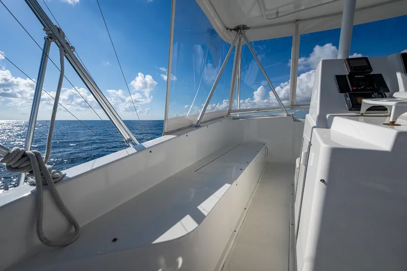 Slide: The Image of 1998 Viking 50 Convertible yacht interior with ocean view and clear blue sky. - 19