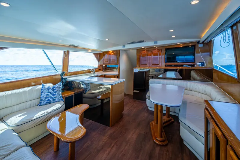 Slide: The Image of Luxurious interior of 1998 Viking 50 Convertible yacht with ocean view. - 28