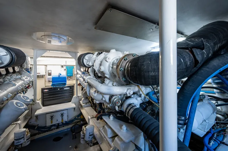 Slide: The Image of Engine room of 1998 Viking 50 Convertible yacht, showcasing machinery and components. - 45