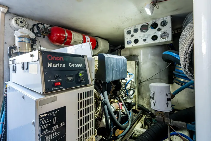 Slide: The Image of Engine room of 1998 Viking 50 Convertible with Onan Marine Genset and control panel. - 50
