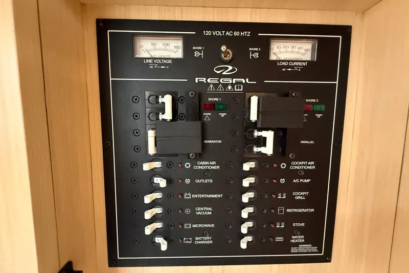 Slide: The Image of Electrical control panel of 2026 Regal 36 Grande Coupe boat. - 108