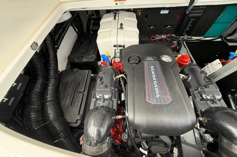 Slide: The Image of Engine compartment of 2026 Regal 36 Grande Coupe featuring Volvo Penta components. - 15