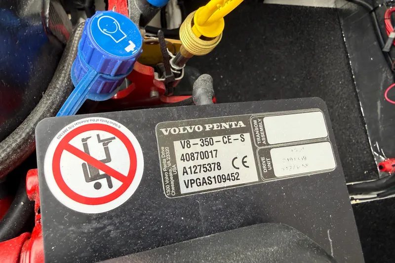 Slide: The Image of Volvo Penta engine label on 2026 Regal 36 Grande Coupe, featuring model and serial numbers. - 19