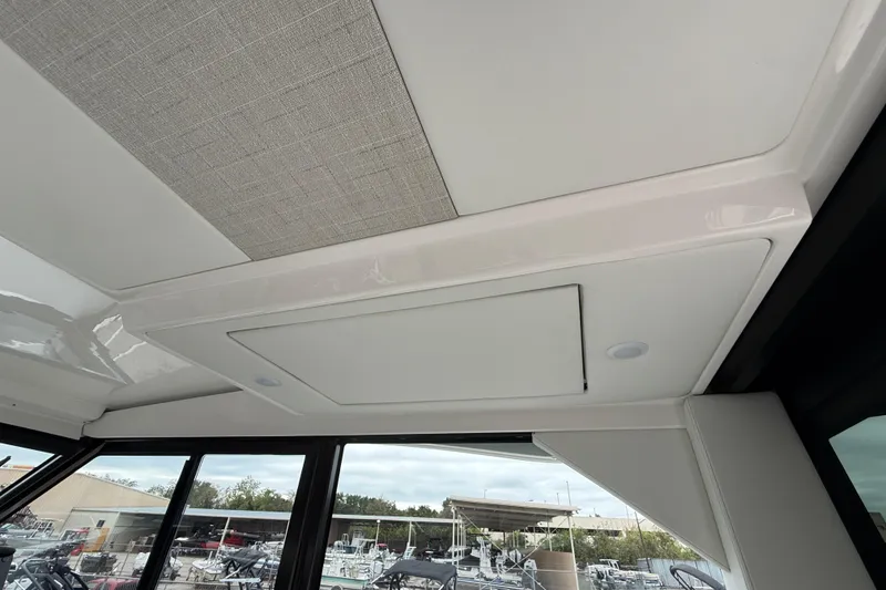 Slide: The Image of Interior ceiling of 2026 Regal 36 Grande Coupe, featuring sleek design and modern finishes. - 46