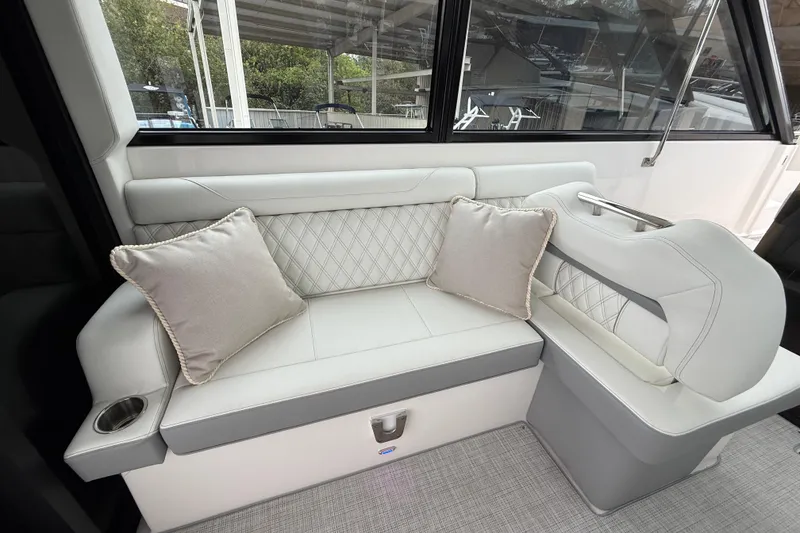 Slide: The Image of Luxurious seating area in 2026 Regal 36 Grande Coupe yacht with elegant cushions. - 50