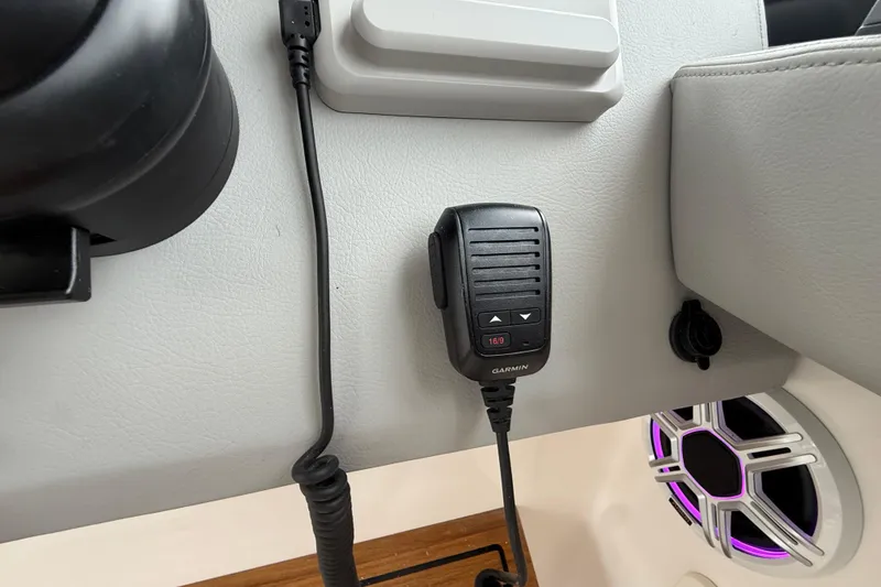 Slide: The Image of Interior of 2026 Regal 36 Grande Coupe with Garmin radio and speaker detail. - 64