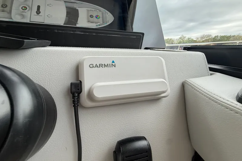 Slide: The Image of Garmin device on 2026 Regal 36 Grande Coupe dashboard, showcasing navigation technology. - 65