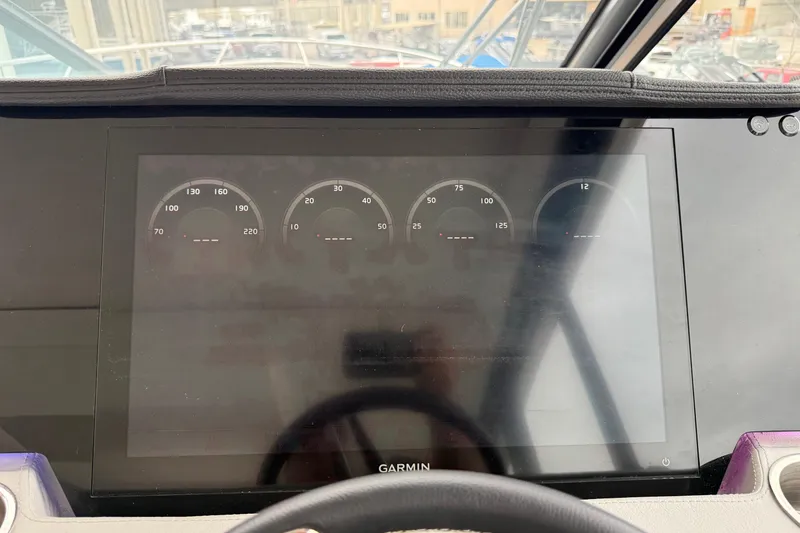 Slide: The Image of Dashboard of 2026 Regal 36 Grande Coupe with Garmin display and gauges. - 68